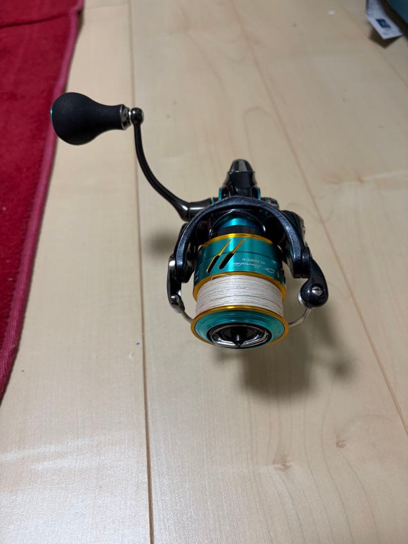スピニングリール ブラック/ターコイズ