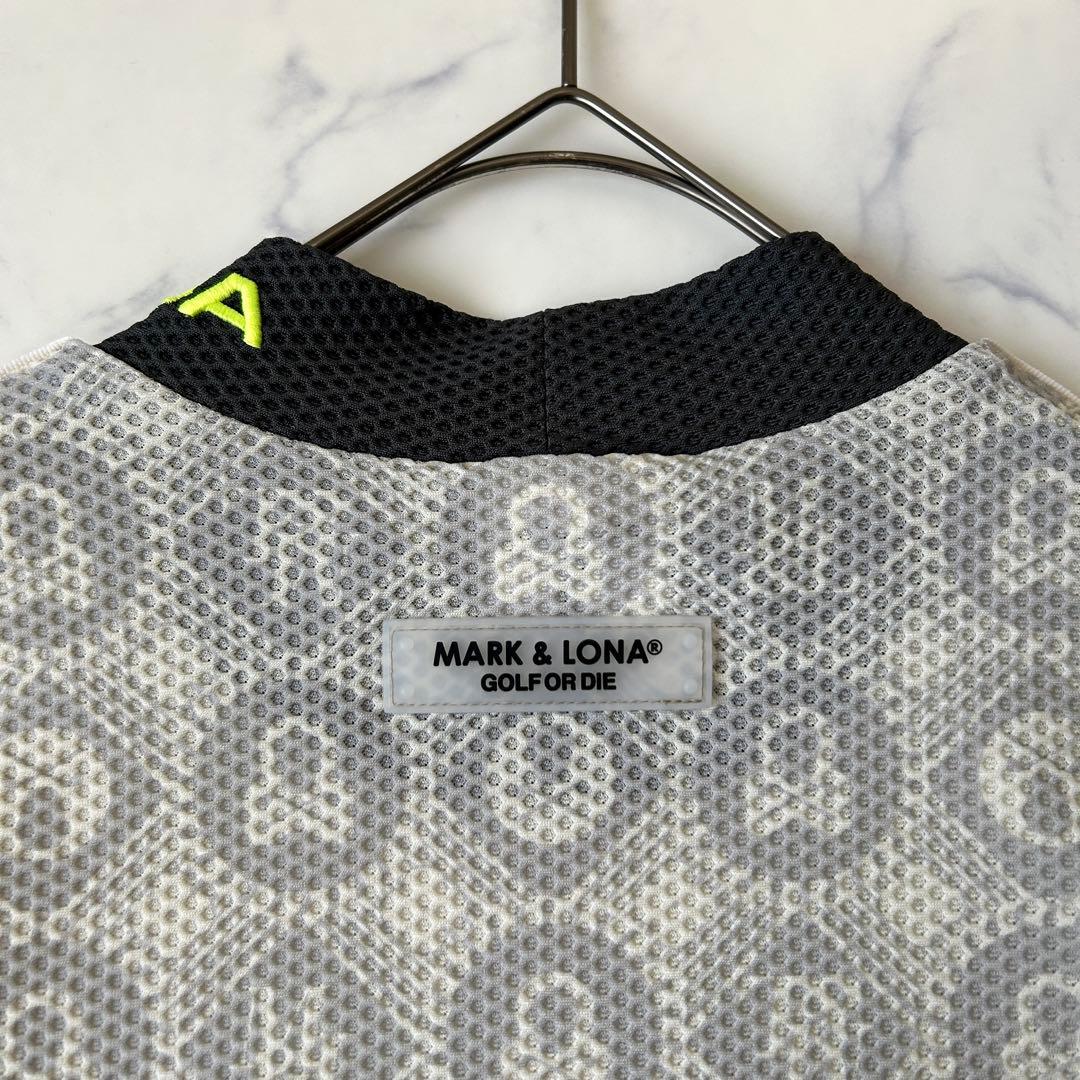 マークアンドロナ 2025年モデル モックネック 総柄 ラバーロゴ タグ付き