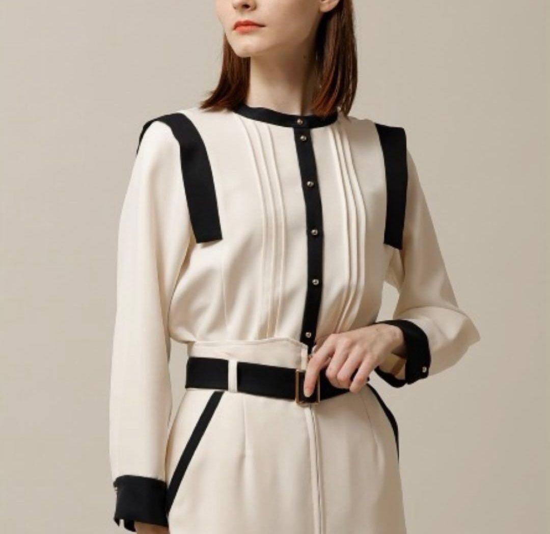 TONAL バイカラーツイルハイネックピンタックブラウス