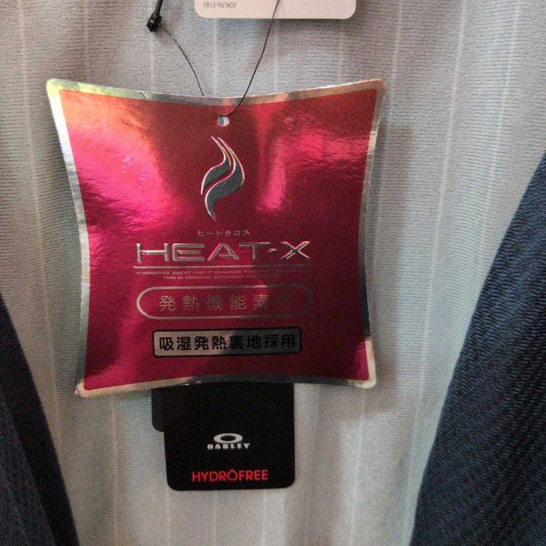 新品タグ付オークリー　ゴルフ　ウィンドブレーカー　XL パープル