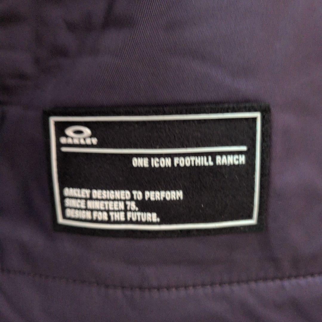 新品タグ付オークリー　ゴルフ　ウィンドブレーカー　XL パープル