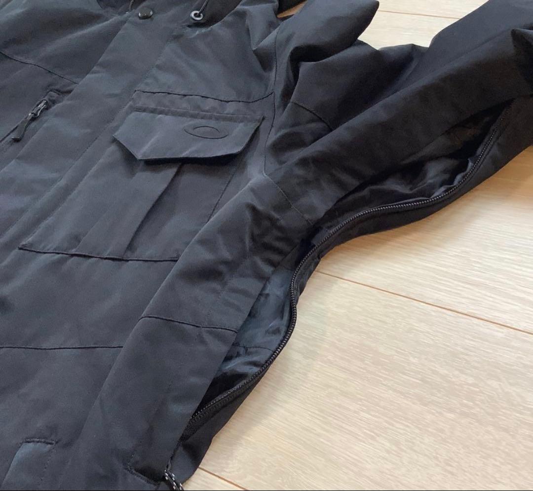 055オークリーOAKLEYブラックメンズスノーボードジャケットウエアーウェアー