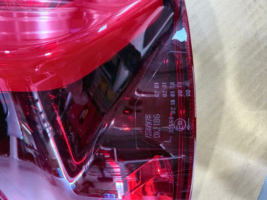 GUN125ハイラックス後期純正テール（左）