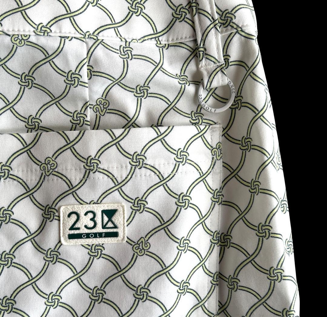 新品タグ付 23区ゴルフ 定価2.4万 総柄ロゴ ストレッチ美脚パンツ白✕緑