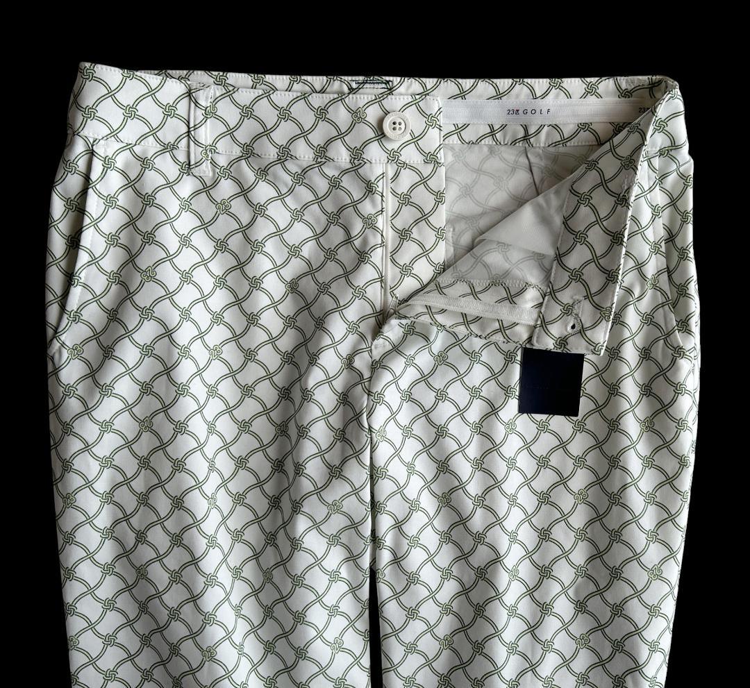 新品タグ付 23区ゴルフ 定価2.4万 総柄ロゴ ストレッチ美脚パンツ白✕緑