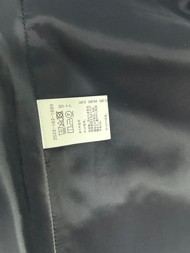 グリーンレーベルリラクシング ジョーゼットペプラムジレ ネイビー