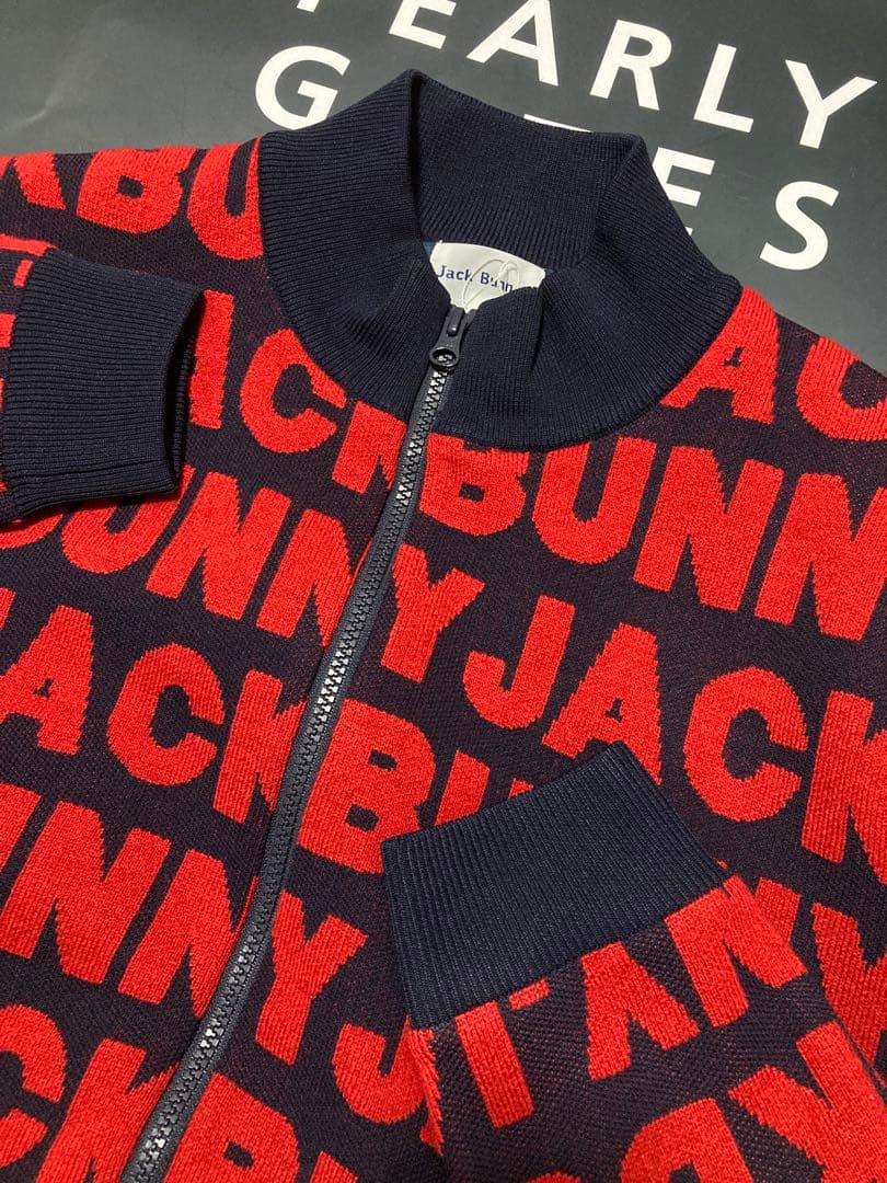 新品 パーリーゲイツ ジャックバニー ロゴジャガード防風裏地ブルゾン(5)L紺赤