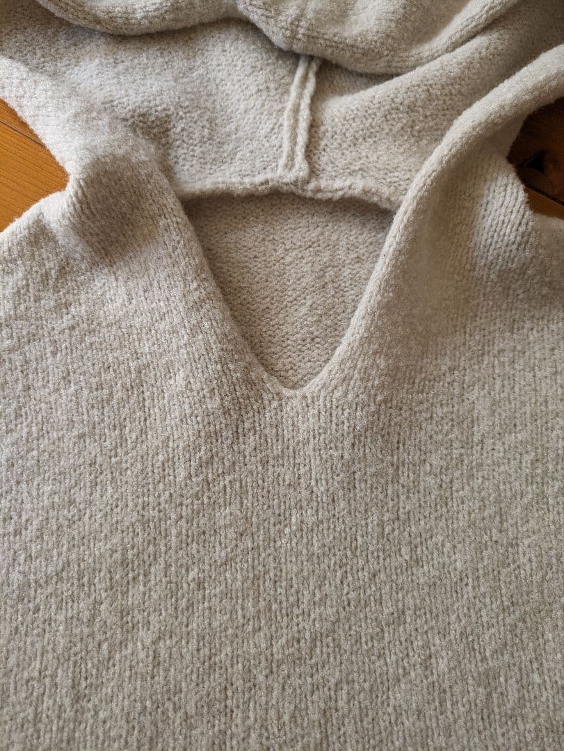 2025年 evam evaリニューウールフードベスト アイボリー