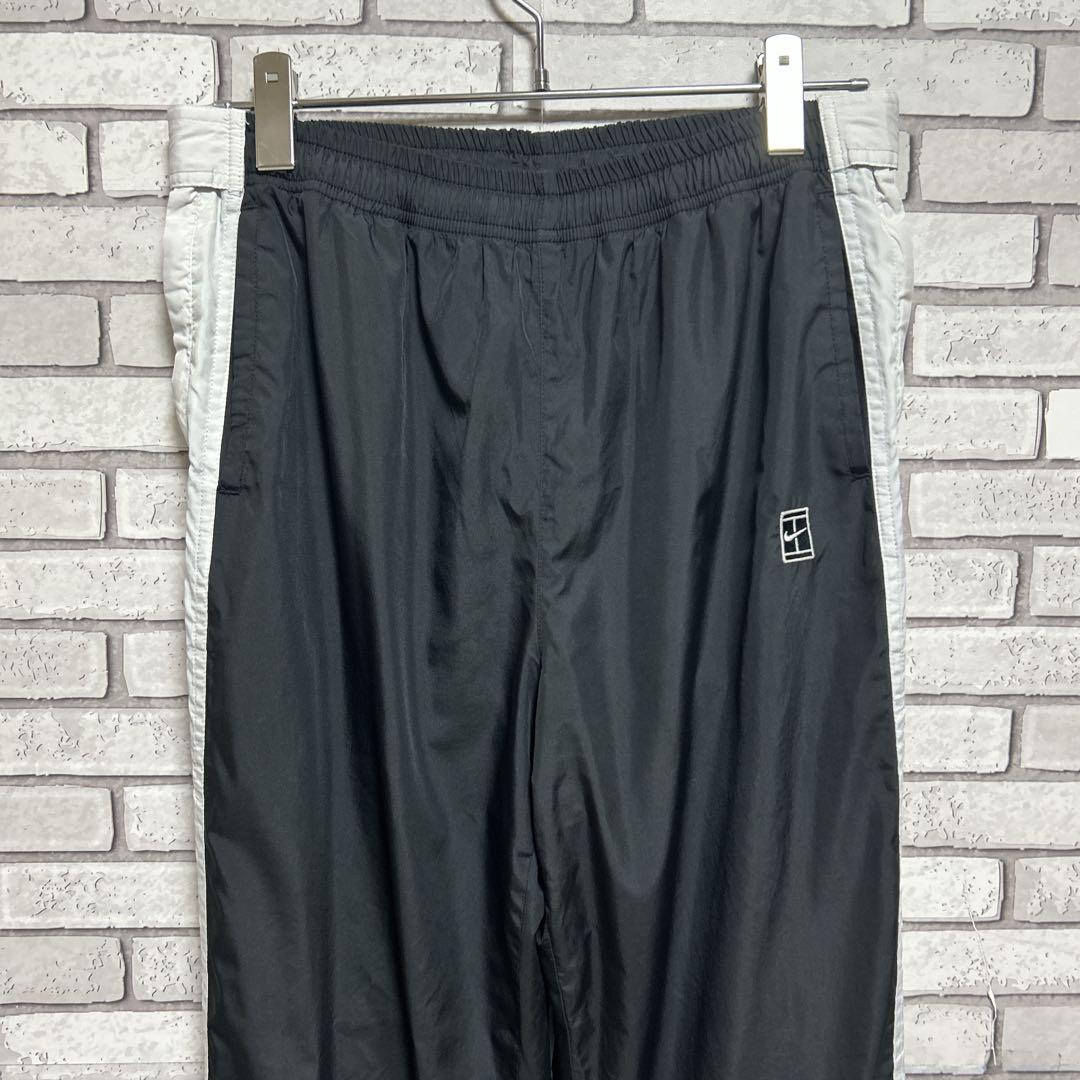 セール《美品》NIKE☆ナイキ☆ナイロンジャージ 刺繍ロゴ 側面チャック 黒/白