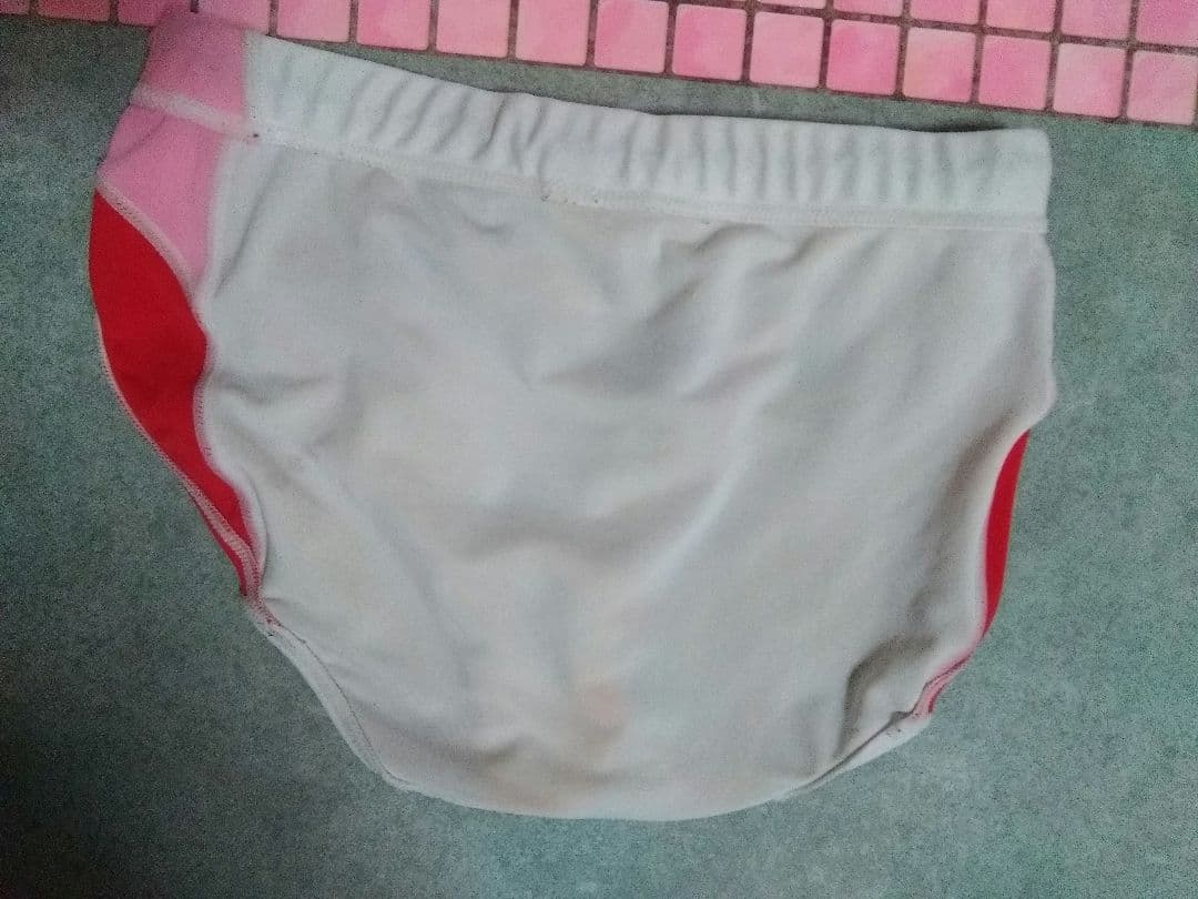 アシックス　陸上用ショーツ ホワイト/レッド/ピンク