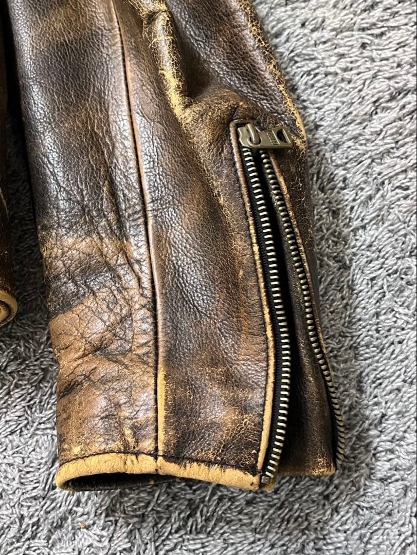 W.R.D CHEVIGNON ライダース L 古着 ライダースジャケット