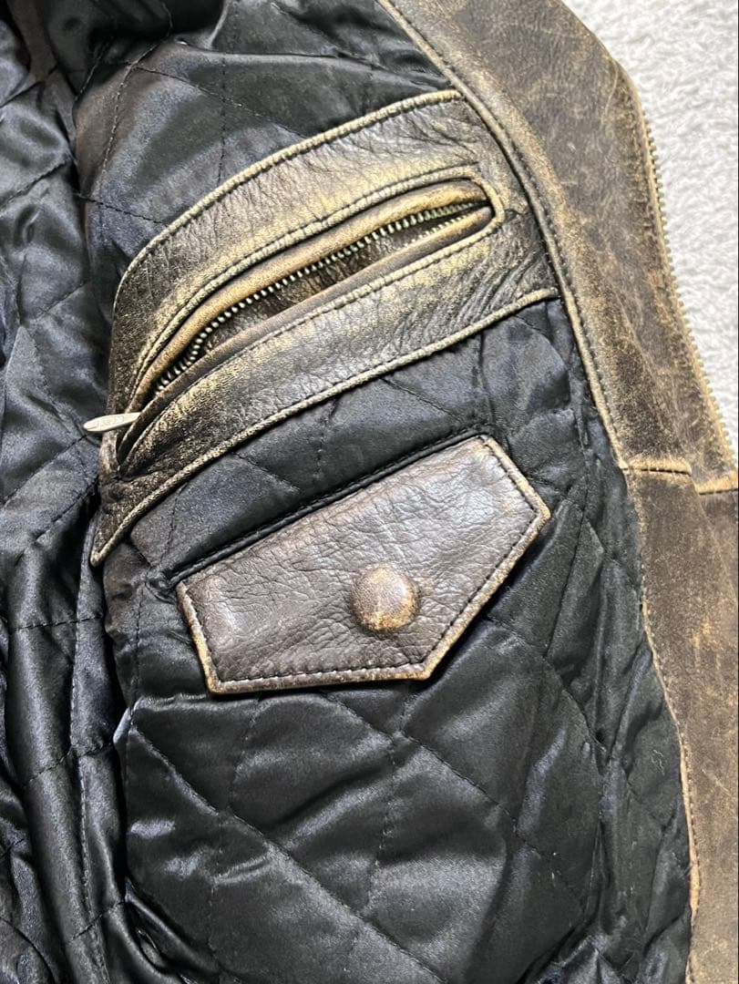 W.R.D CHEVIGNON ライダース L 古着 ライダースジャケット