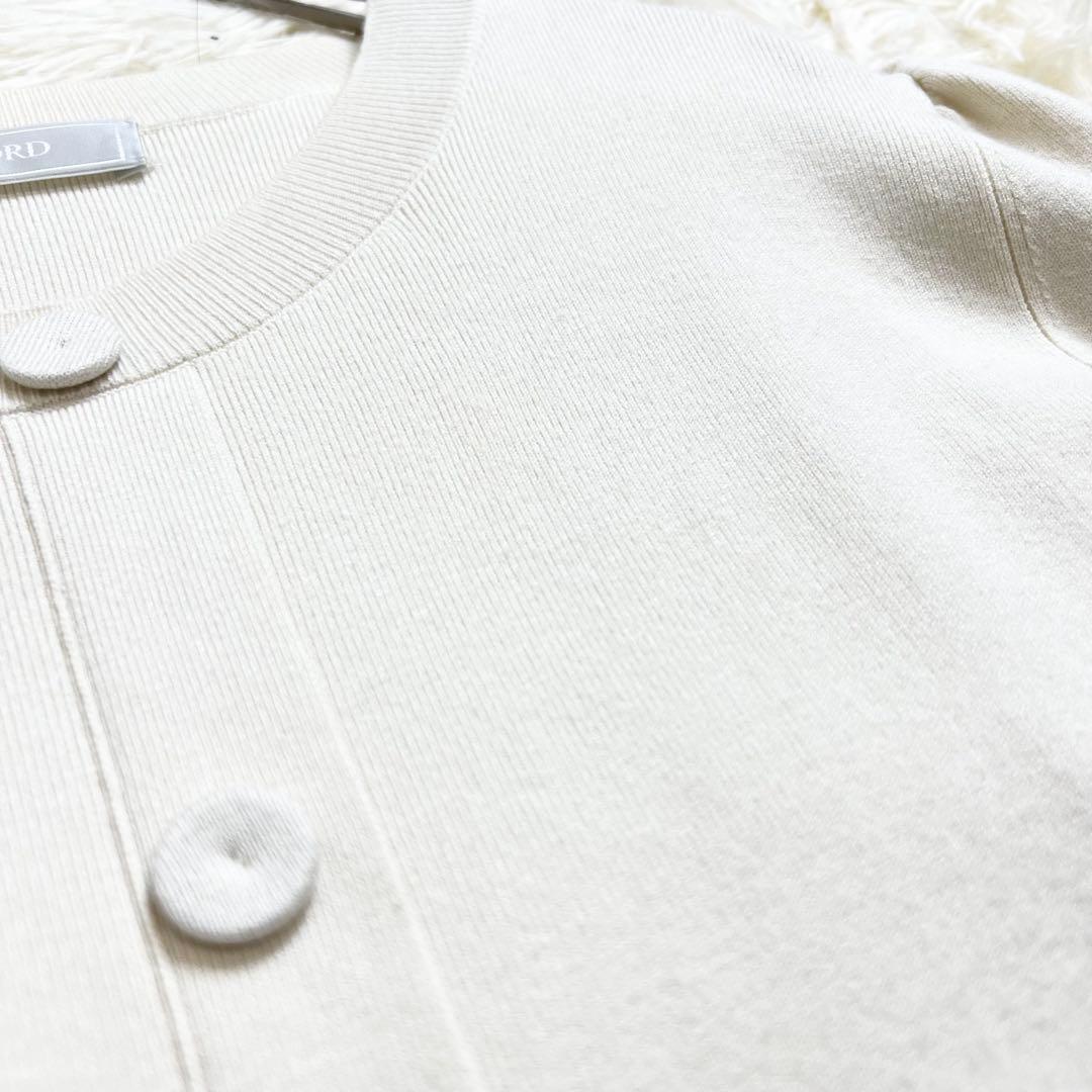 セルフォード ロングワンピース クリスタルプリーツニット リボン オフホワイト