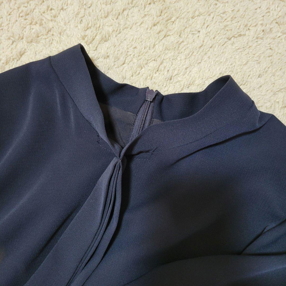 ナチュラルビューティーベーシック ボウタイプリーツワンピース ネイビー M