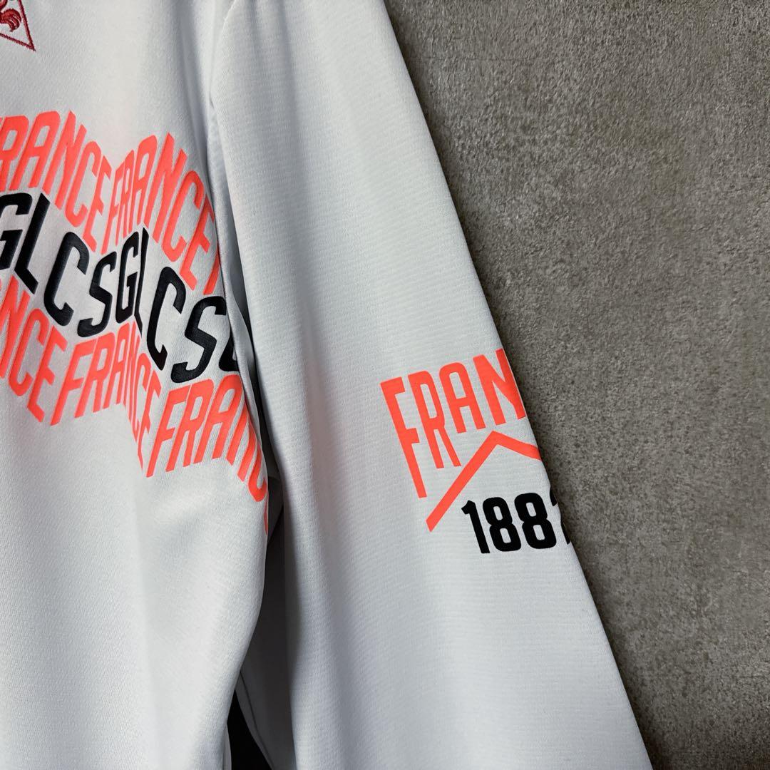 le coq sportif ルコック ロゴ総柄 長袖ポロシャツ ホワイト M