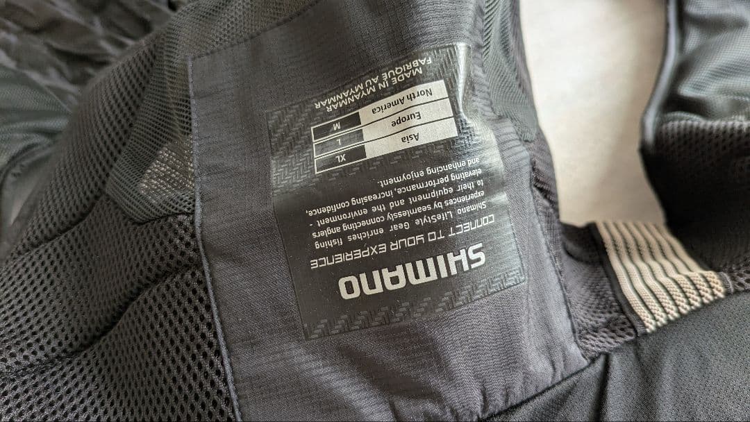 シマノ　ve-011P　ウインドストッパー　ブラックゴールド　XL