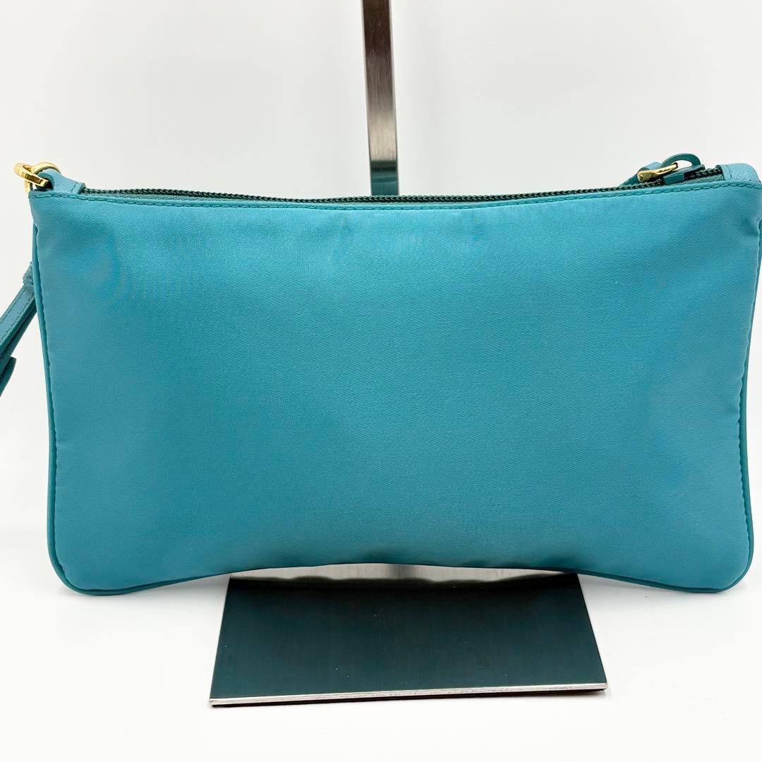 PRADA ポーチ ナイロン ターコイズブルー ロゴ ジャガード ゴールド金具