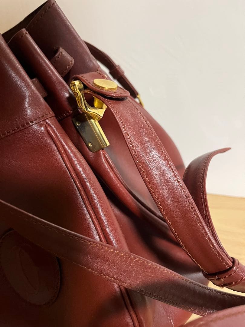 【未使用品 】カルティエ マストライン 巾着ショルダーバッグ レザー ボルドー