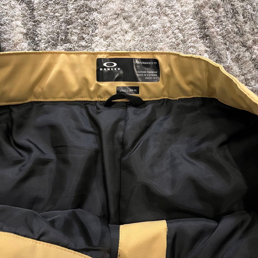 新品タグ付き OAKLEY メンズ スノーパンツ US L（日本XL相当）