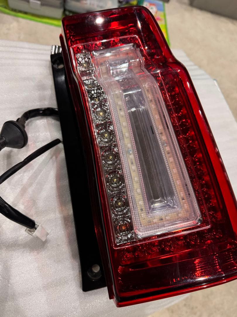 i*o様 LA600 タント タントカスタム テールランプ　クリスタルアイ　TA